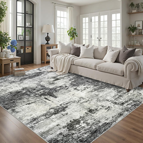 Tosuoka front view of 8x10 abstract black rug shows modern look and visual anchor