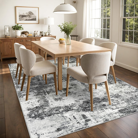 Tosuoka rug in living room styled with sofa adds modern warmth to décor