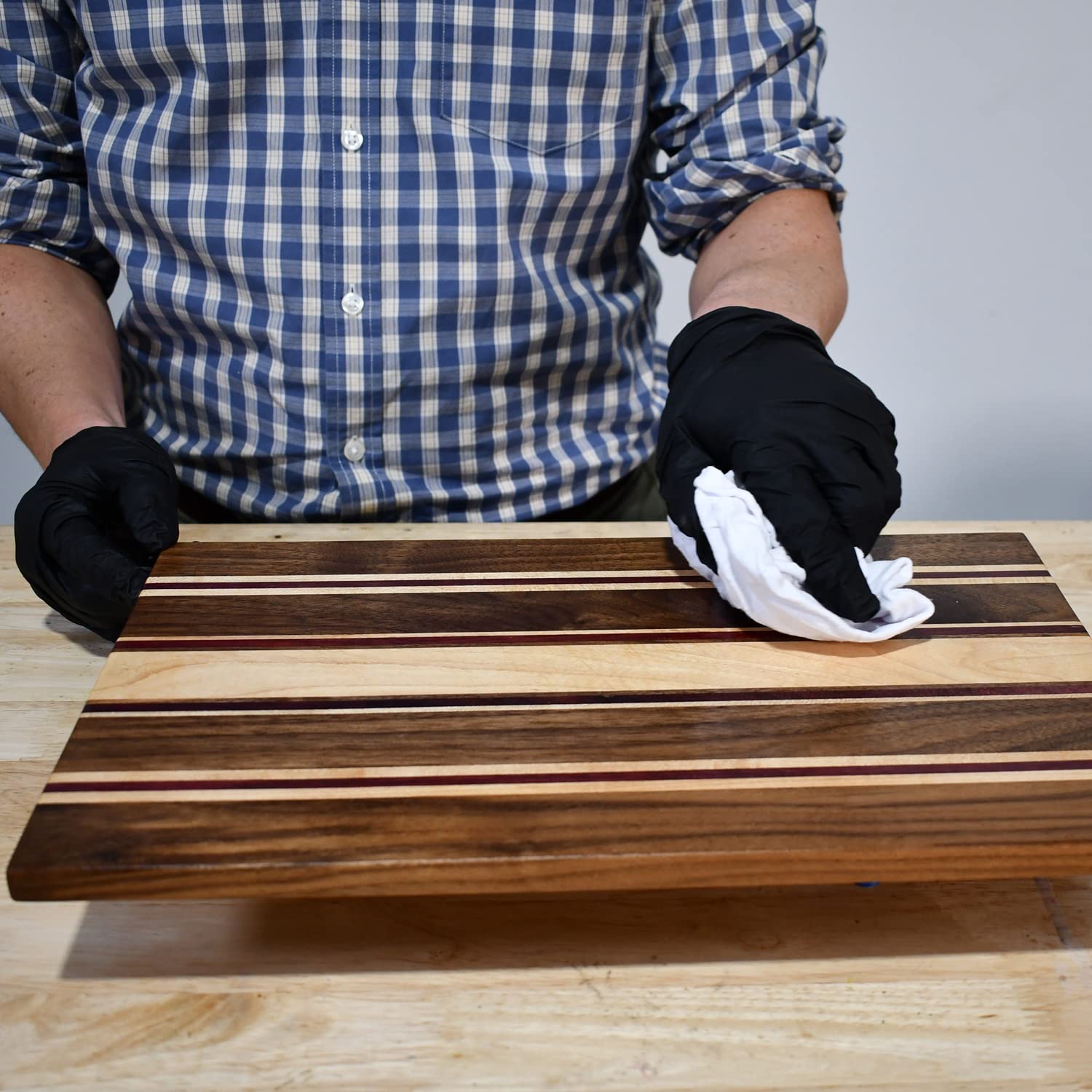 TotalBoat finished charcuterie board in kitchen highlighting food-safe finish