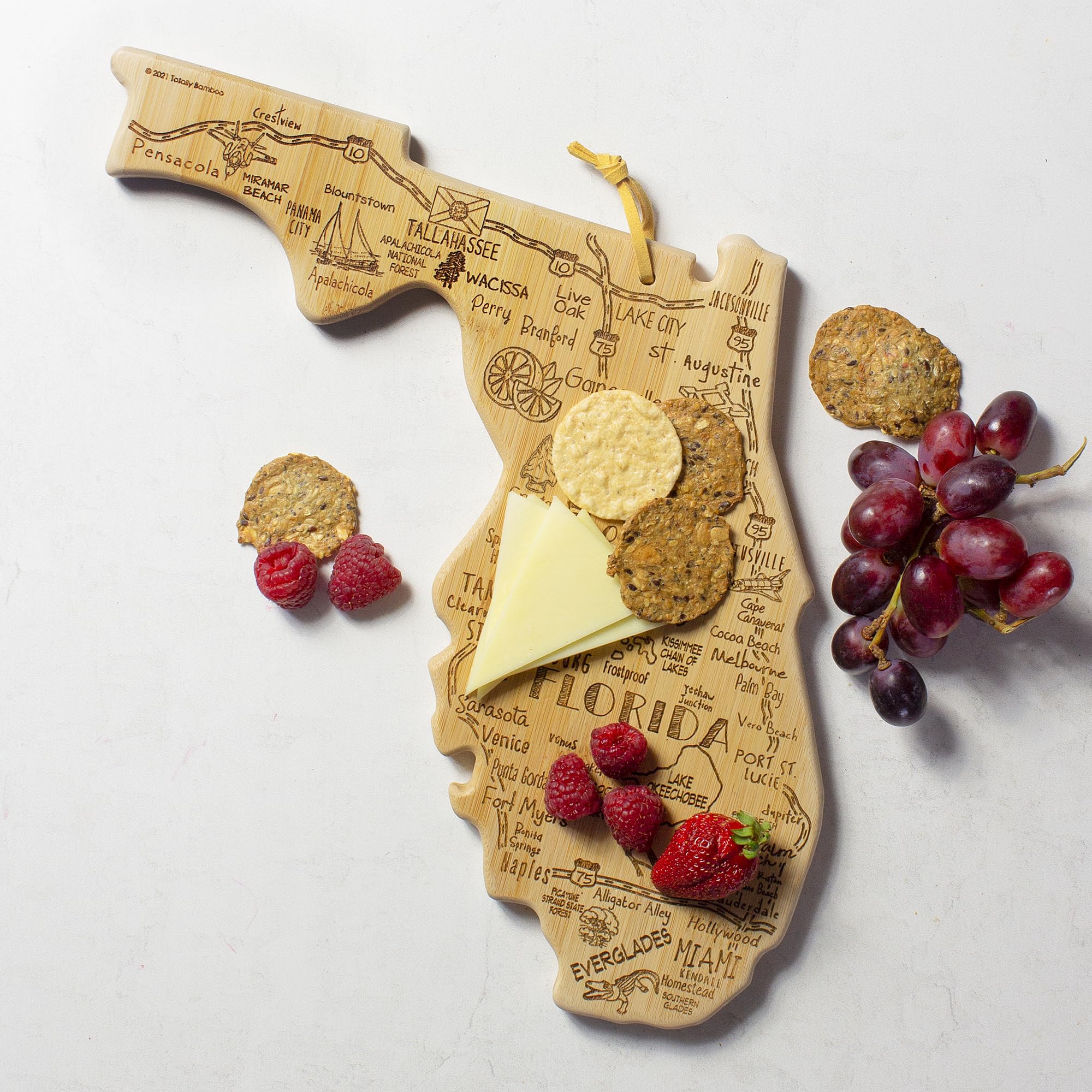 Totally Bamboo used as a charcuterie board to present cheese and meats