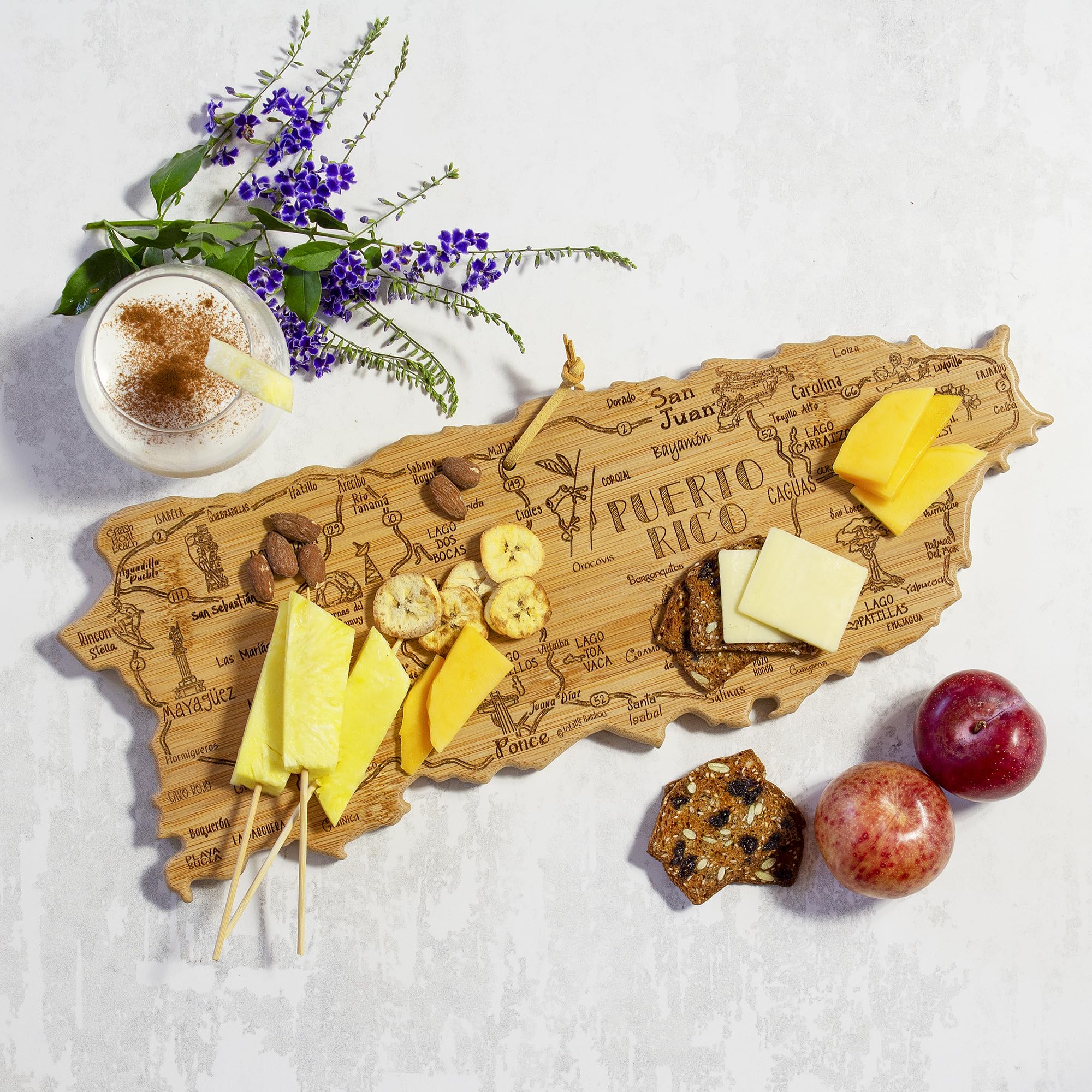 Totally Bamboo board next to ruler showing 18 by 7 inch dimensions for size clarity
