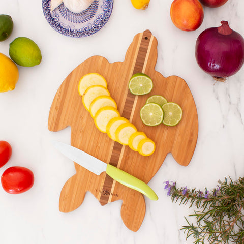 Totally Bamboo board arranged with cheeses and fruit demonstrating serving use