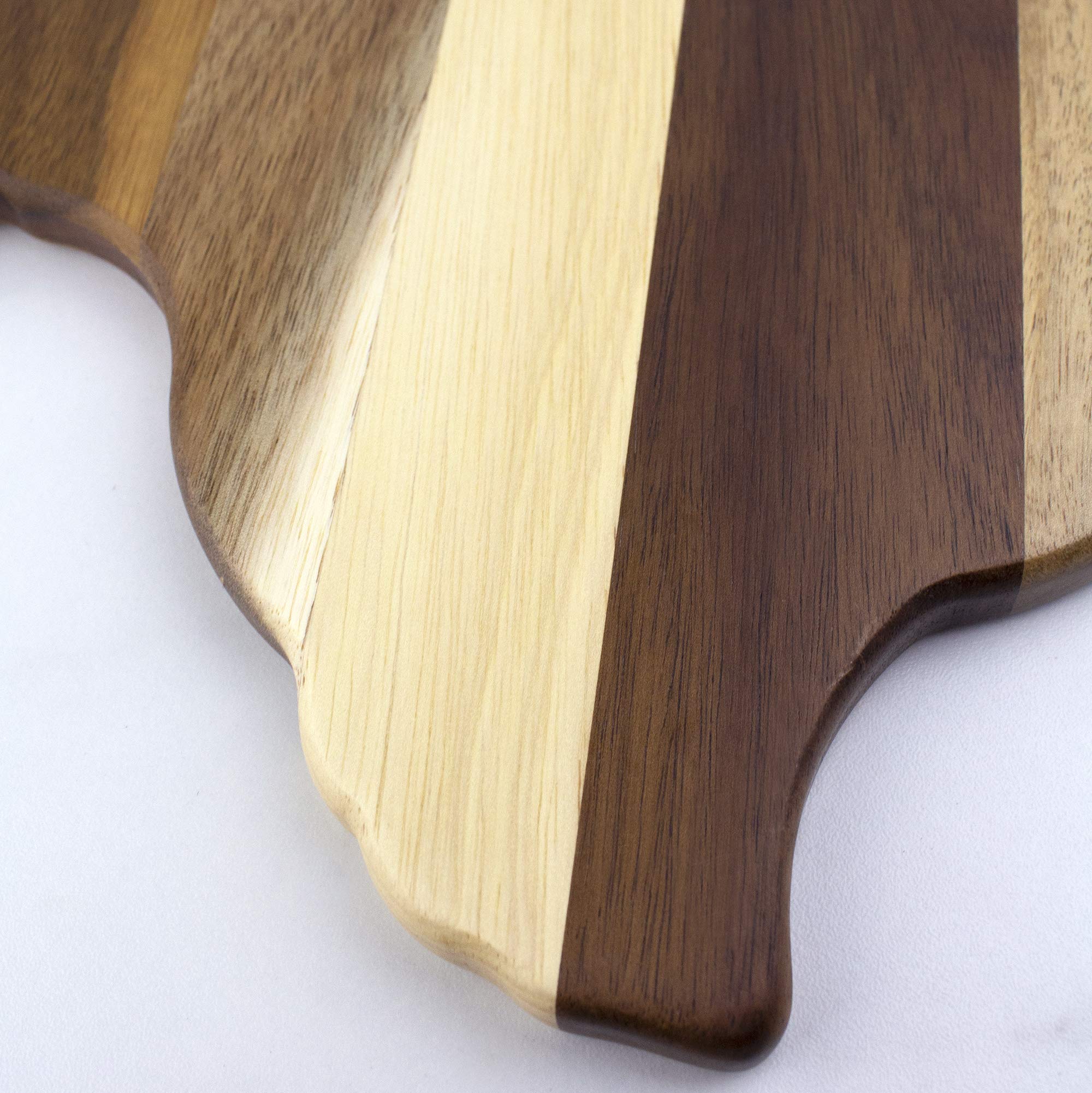 Totally Bamboo board hung on kitchen wall as decor emphasizing dual-purpose use