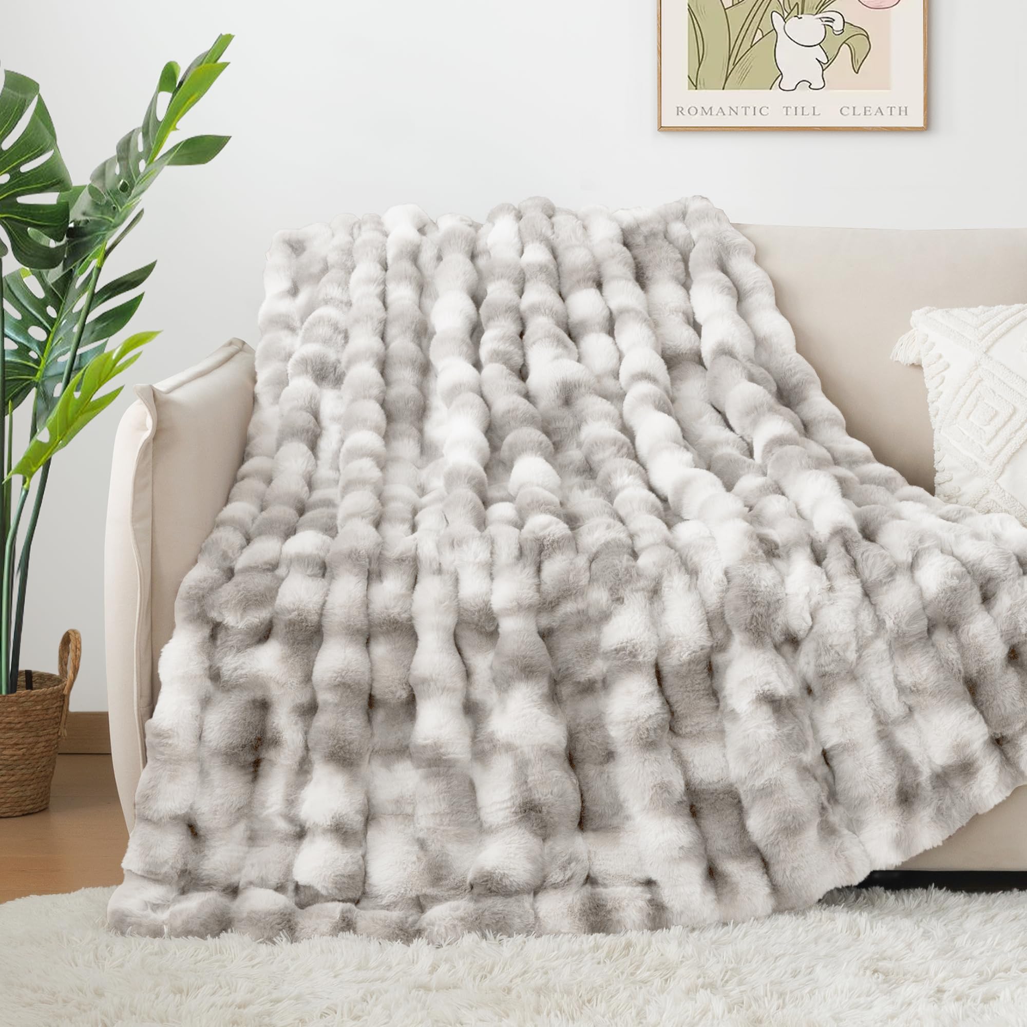 Touchat blanket layered on bed elevating bedroom decor and extra warmth