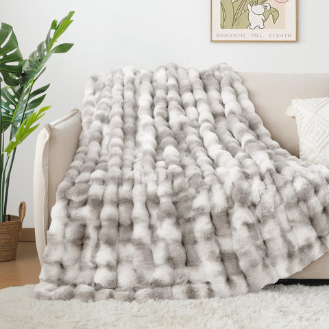 Touchat blanket layered on bed elevating bedroom decor and extra warmth