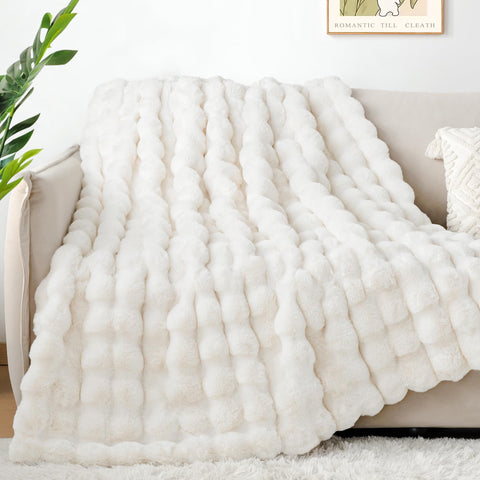 Touchat blanket draped on sofa adding warmth and elegant decor benefit