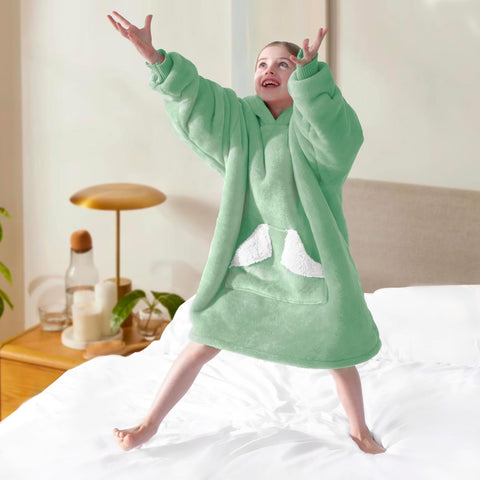 Touchat child wearing blanket hoodie in living room showing comfortable mobility benefit