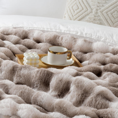 Touchat boxed throw ready to gift conveying premium presentation benefit