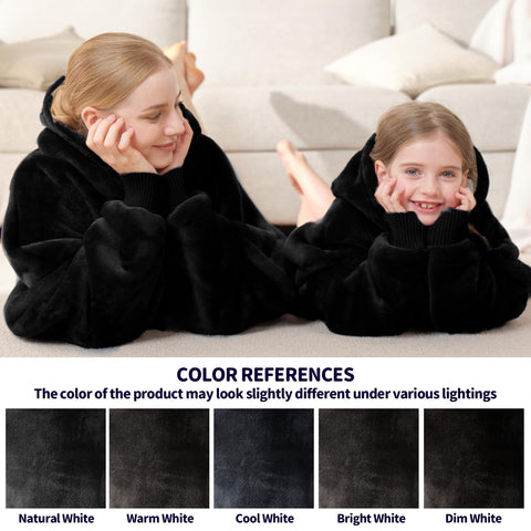 Touchat children wearing blanket outdoors staying warm at evening events