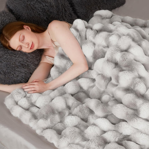 Touchat blanket draped on sofa in living room adding instant sophistication