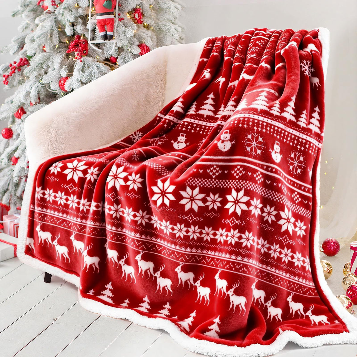 Touchat front view of red reindeer blanket showing festive pattern and cozy look