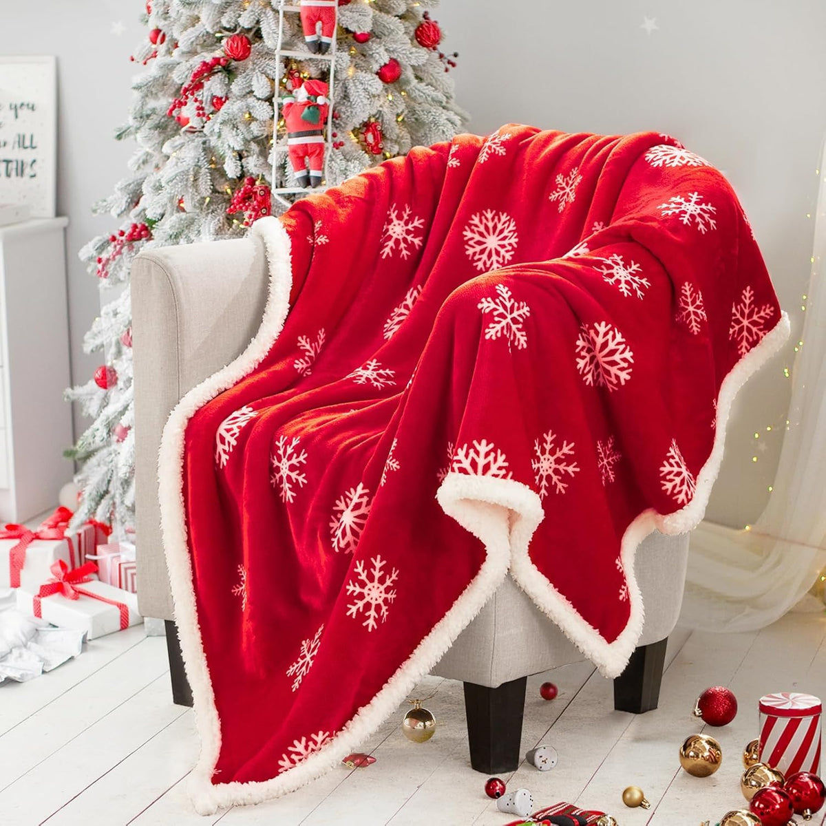 Touchat red sherpa blanket front view showing festive snowflake print and cozy appearance