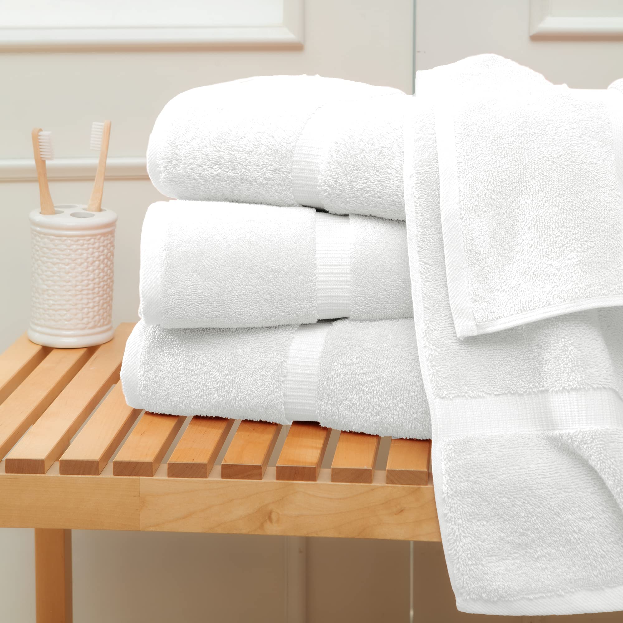 Towel Bazaar towels on lap for size comparison and family-ready scale