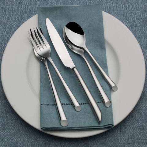 Towle Living Wave flatware styled on a modern table showing how it elevates place settings