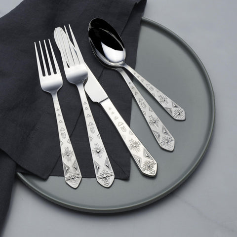 Towle Pueblo on a styled dining table showing brand elevates everyday meals with warm design