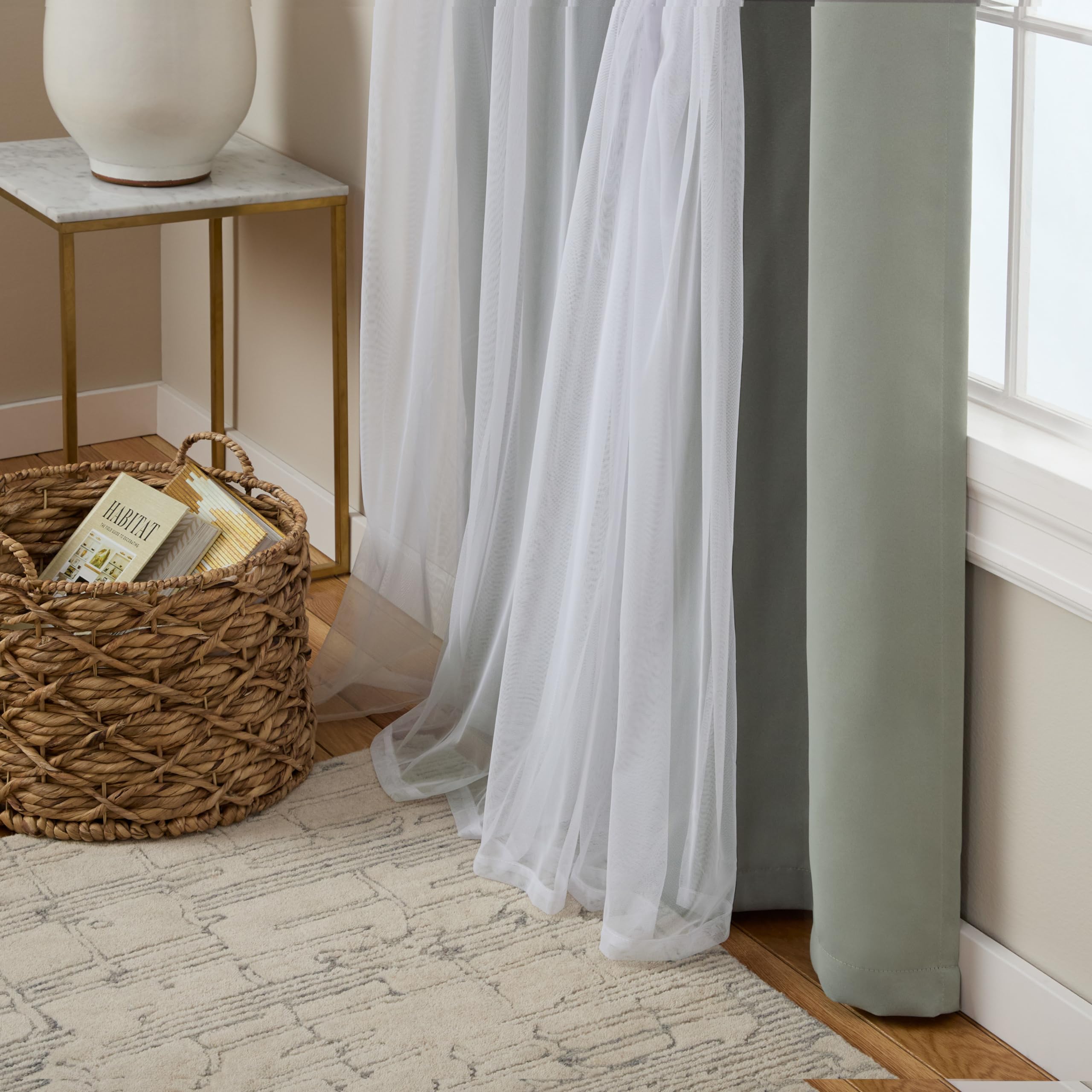 TOWN & COUNTRY LUXE curtains beside chair showing true size and scale benefit