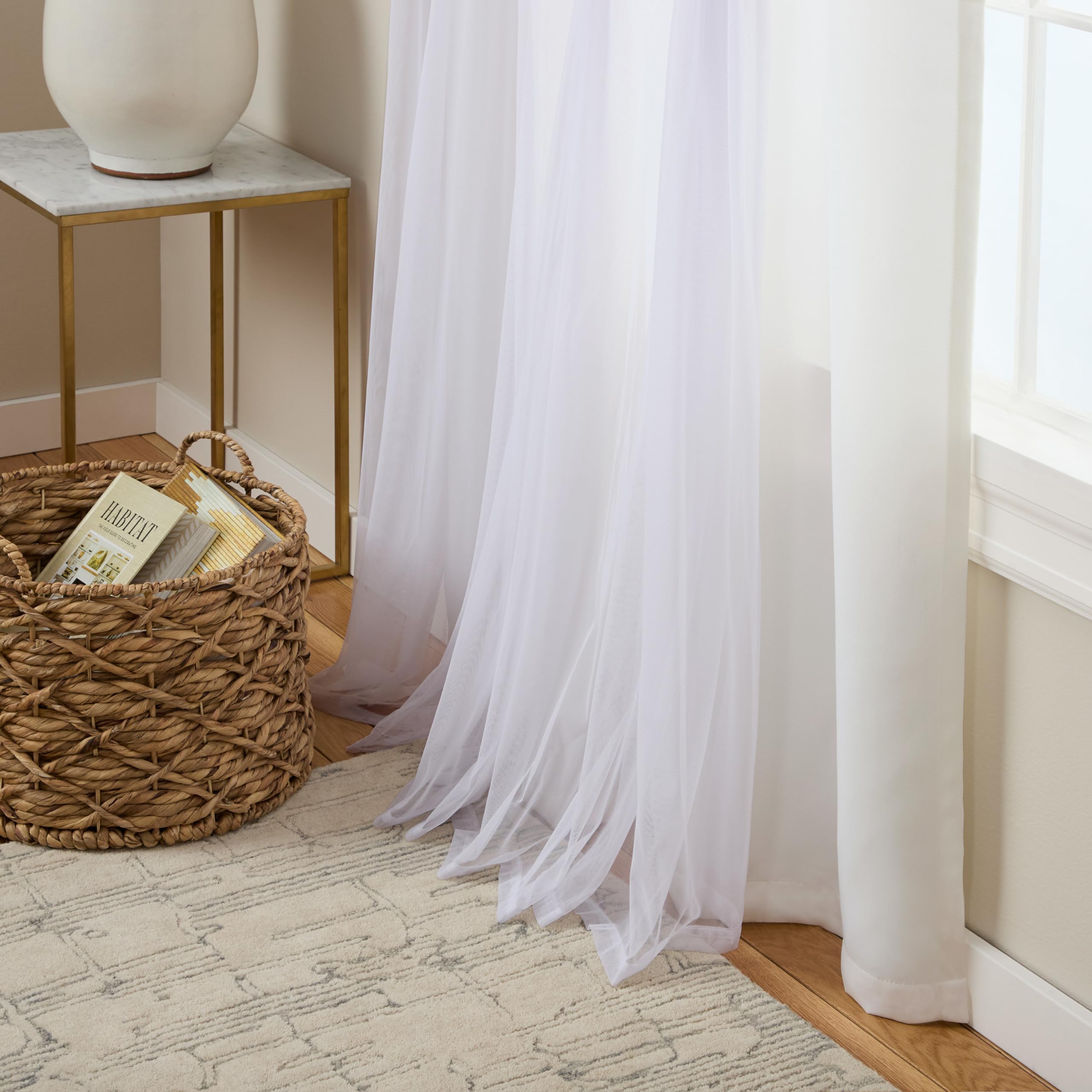 TOWN & COUNTRY LUXE split view of sheer and blackout layers showing flexible light control benefit