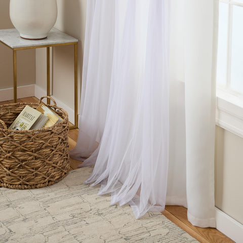TOWN & COUNTRY LUXE split view of sheer and blackout layers showing flexible light control benefit