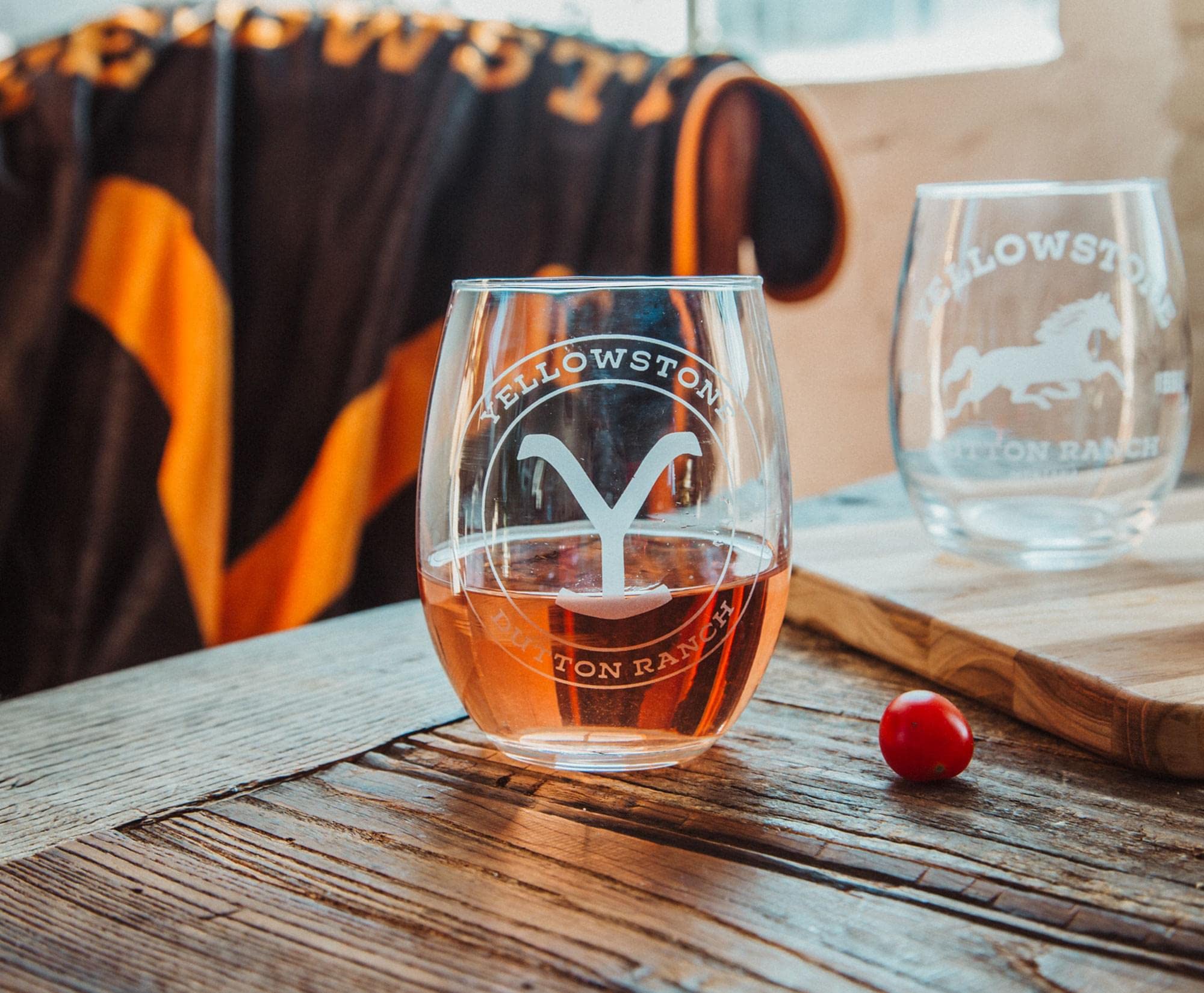 Toynk glasses on patio table lifestyle scene showing ranch-inspired atmosphere benefit