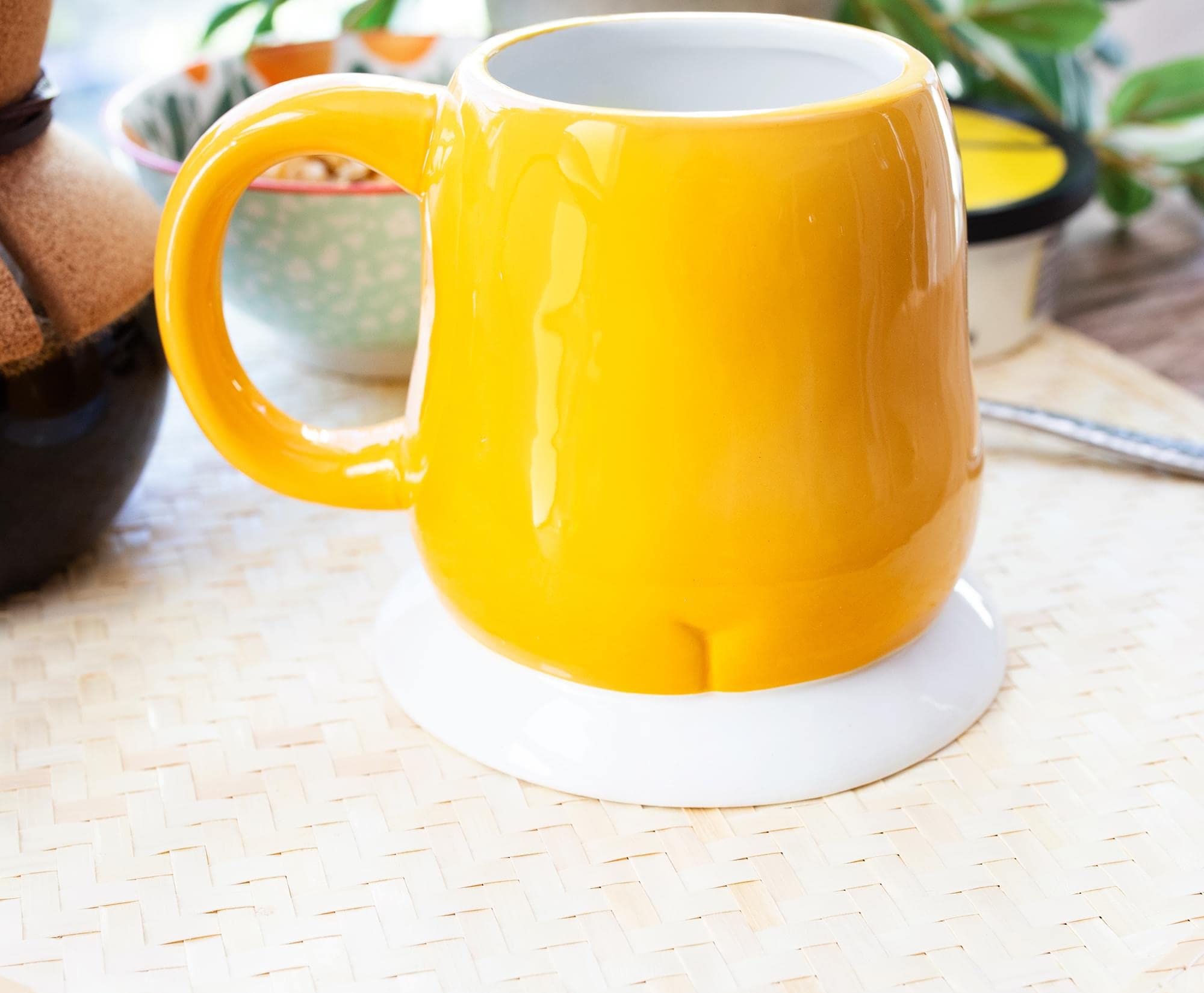 Toynk Gudetama underside showing ceramic markings and stable wide base assurance