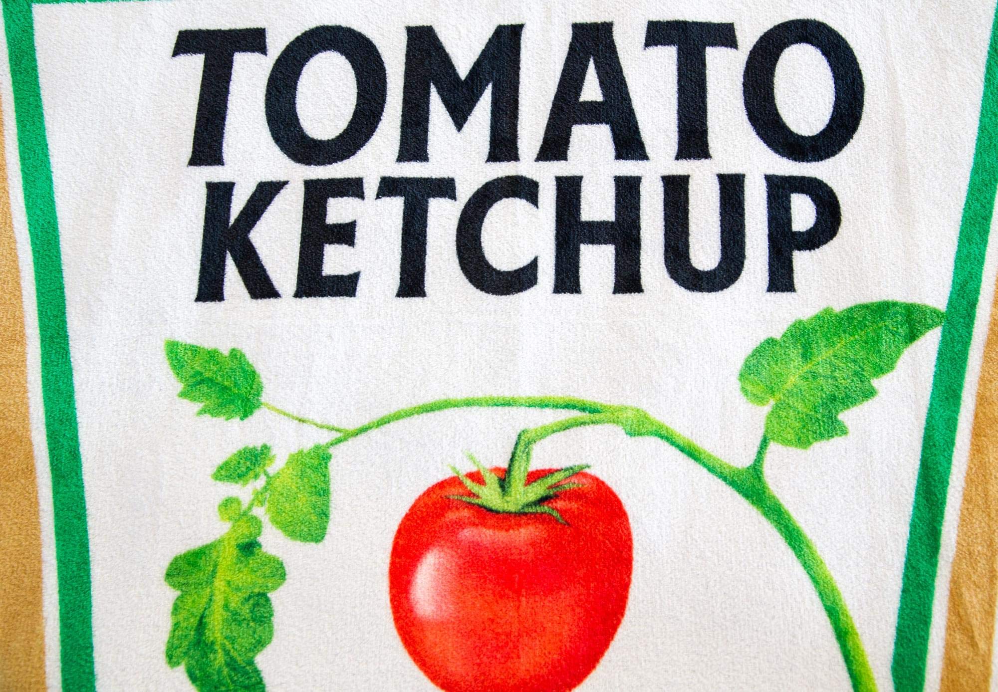 Toynk Heinz Ketchup throw folded on shelf highlighting compact storage and easy display