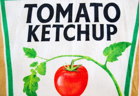 Toynk Heinz Ketchup throw folded on shelf highlighting compact storage and easy display
