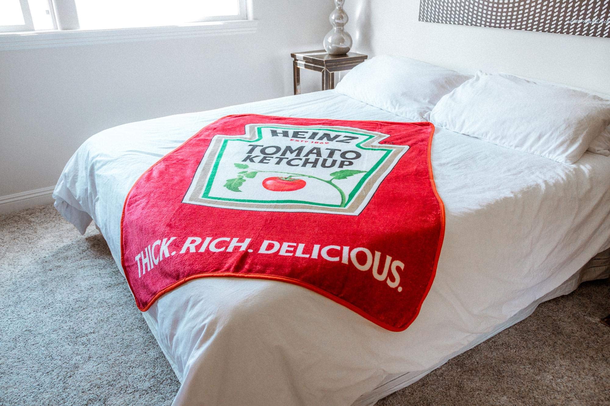 Toynk Heinz Ketchup throw on chair for size comparison demonstrating roomy 45 by 60 inches