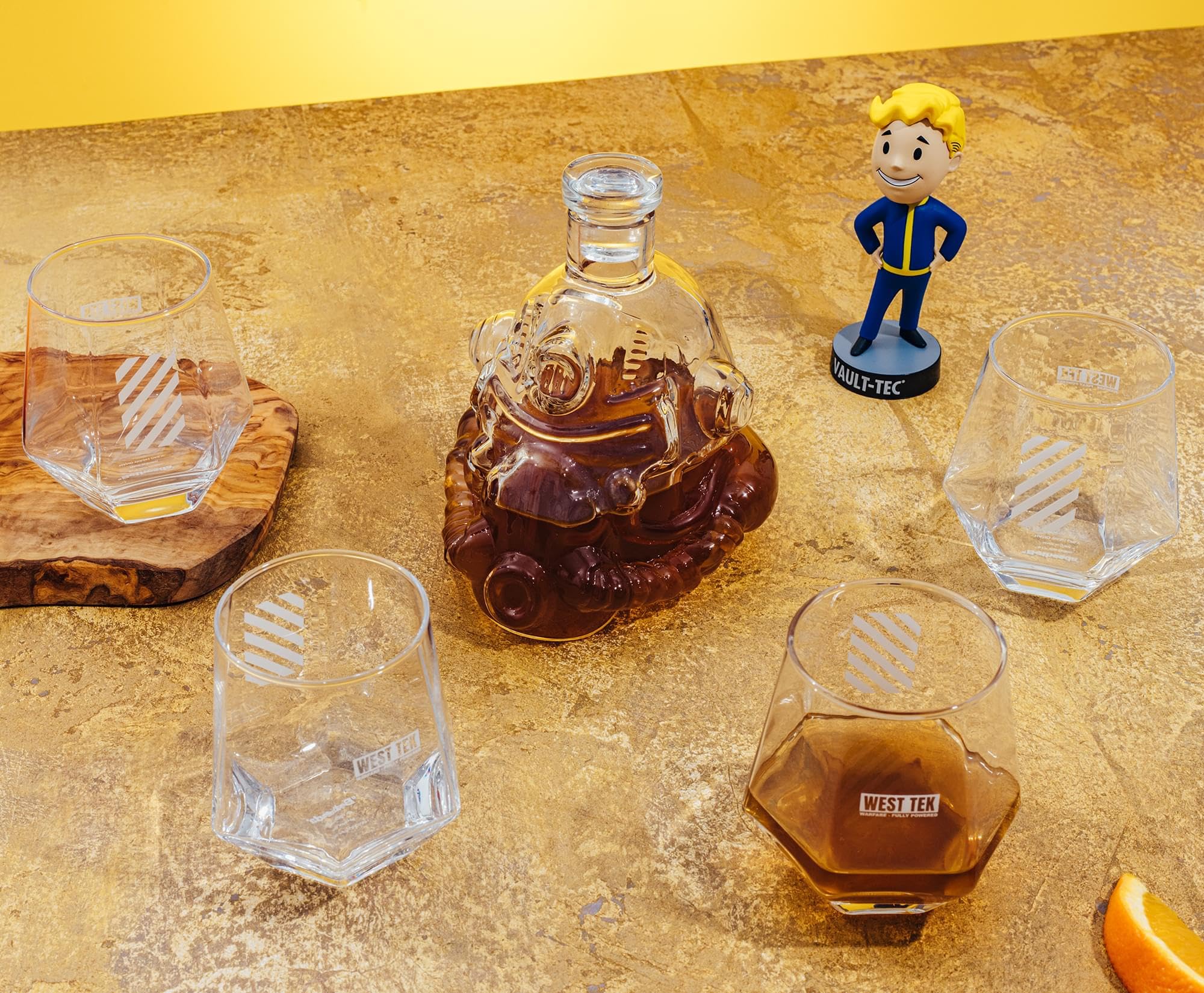 Toynk decanter next to a standard bottle for scale showing true capacity and size