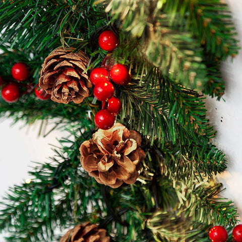 TQS pine cones and red berries detail adding seasonal color benefit