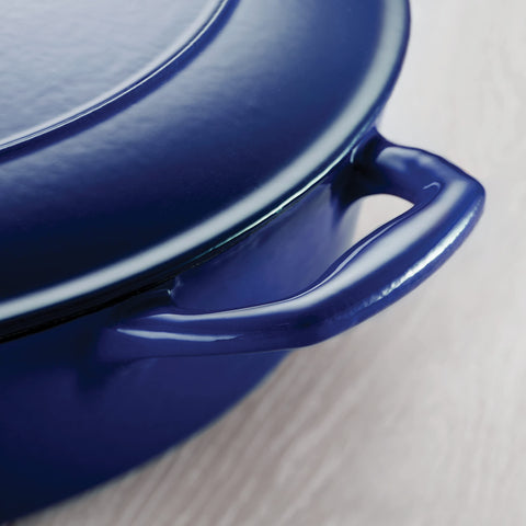 Tramontina braiser in oven with roast demonstrating oven-safe versatility