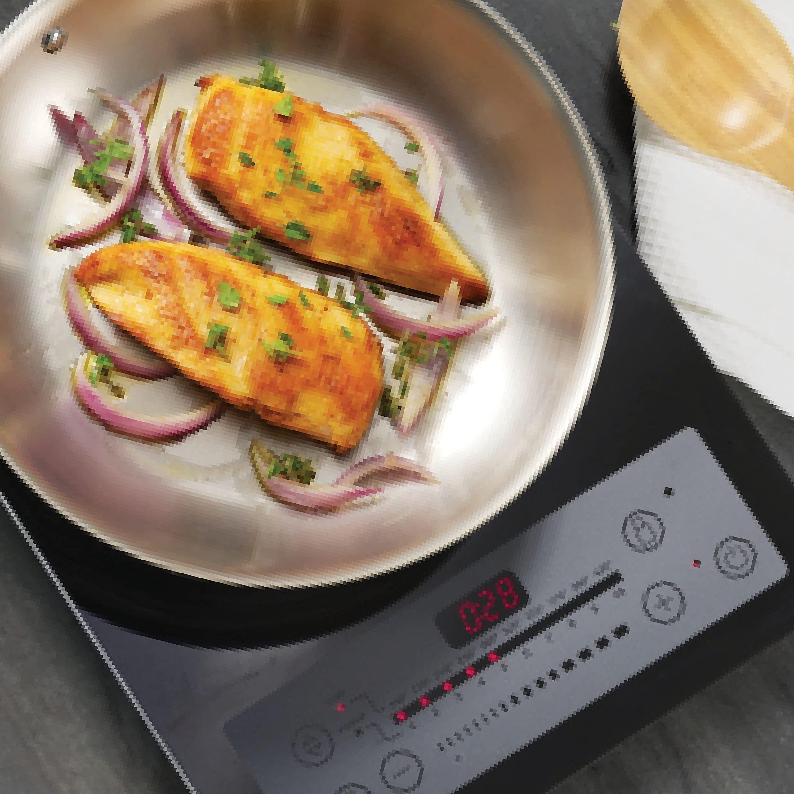 Tramontina cooking an omelet in pan showing precise heat control and flipping performance