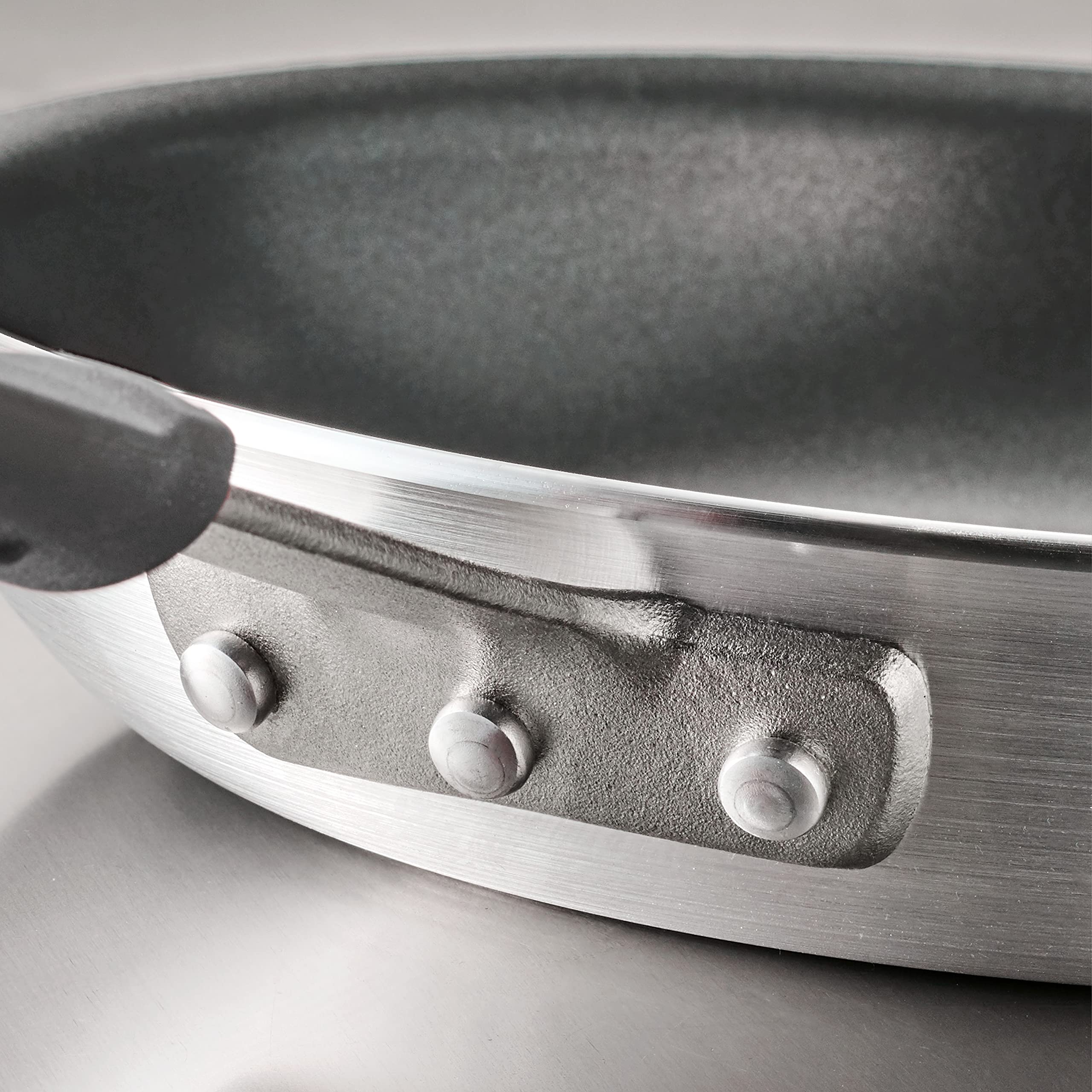 Tramontina lifting omelet cleanly to show reinforced nonstick food release