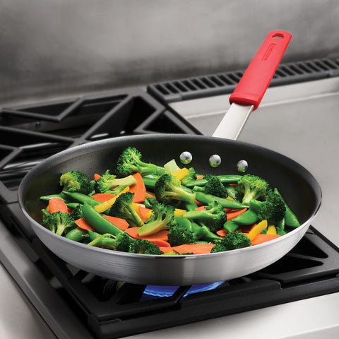 Tramontina nonstick interior close-up highlighting reinforced coating for easy release