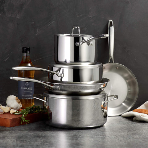 Tramontina stacked stainless steel lids demonstrating tight fit and moisture retention