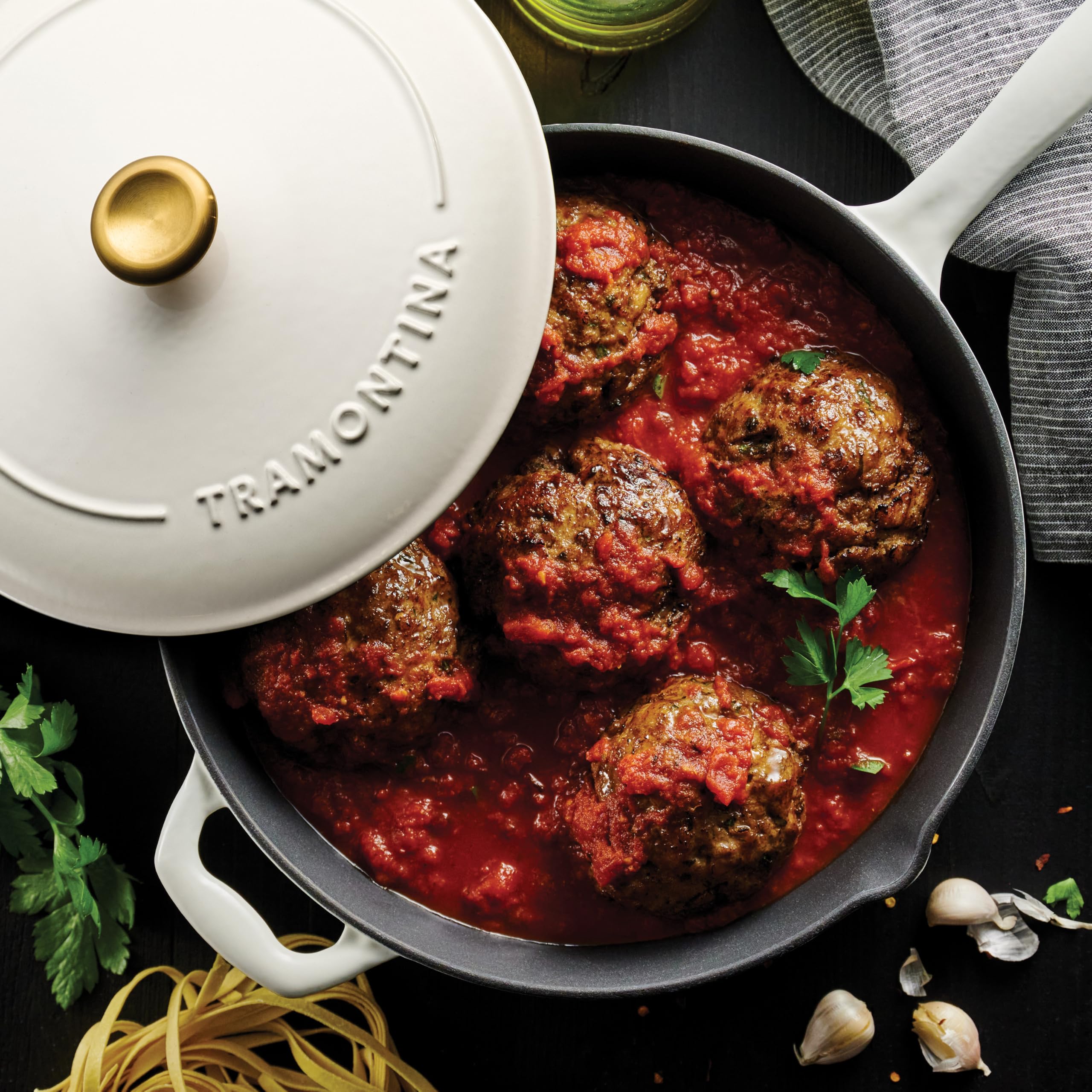 Tramontina matte-black enamel interior showing nonstick-like surface and easy cleanup