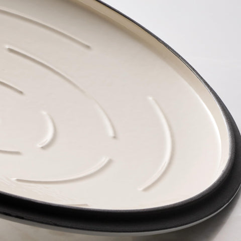 Tramontina skillet on induction cooktop demonstrating wide compatibility benefit