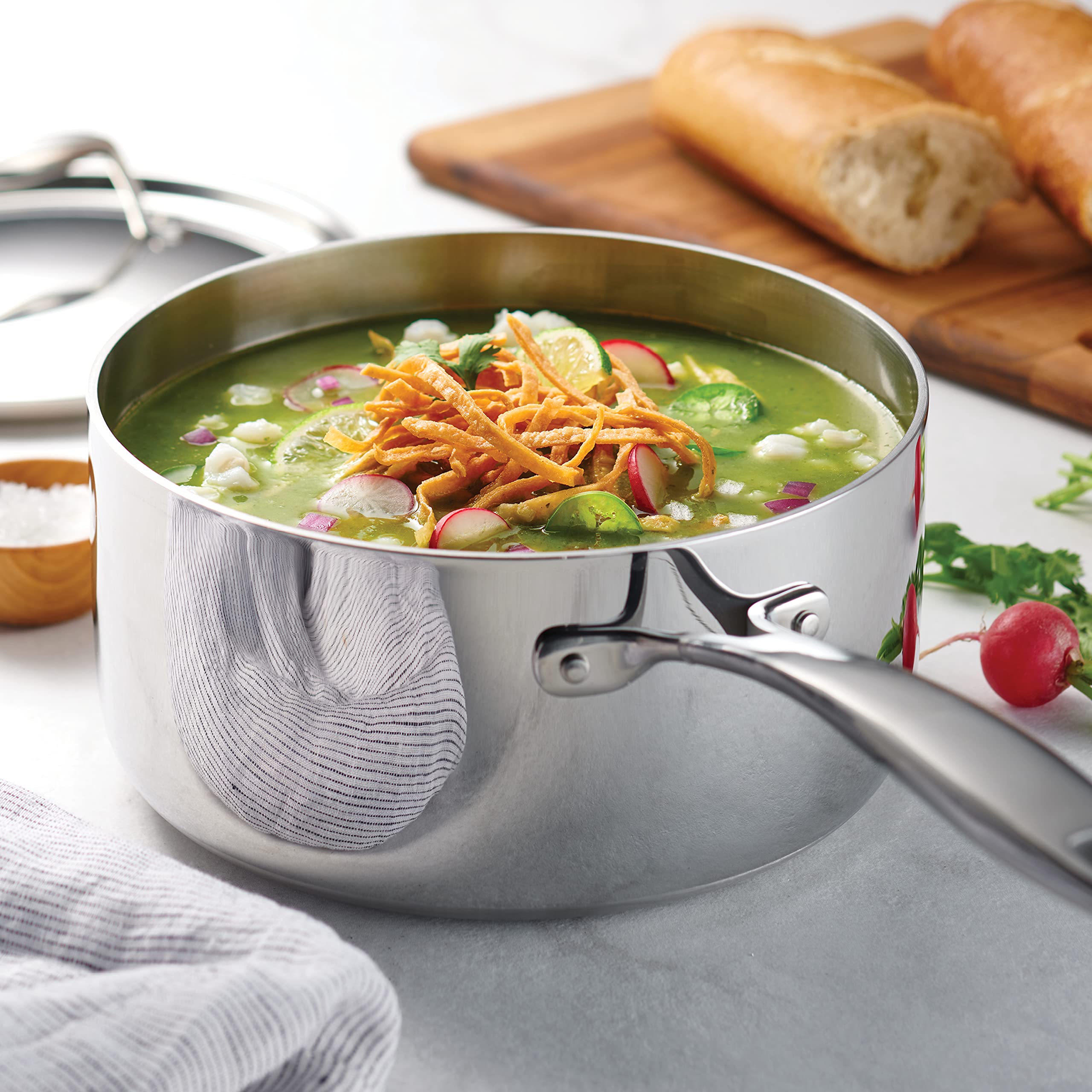 Tramontina stainless steel lid detail locking in moisture and flavor