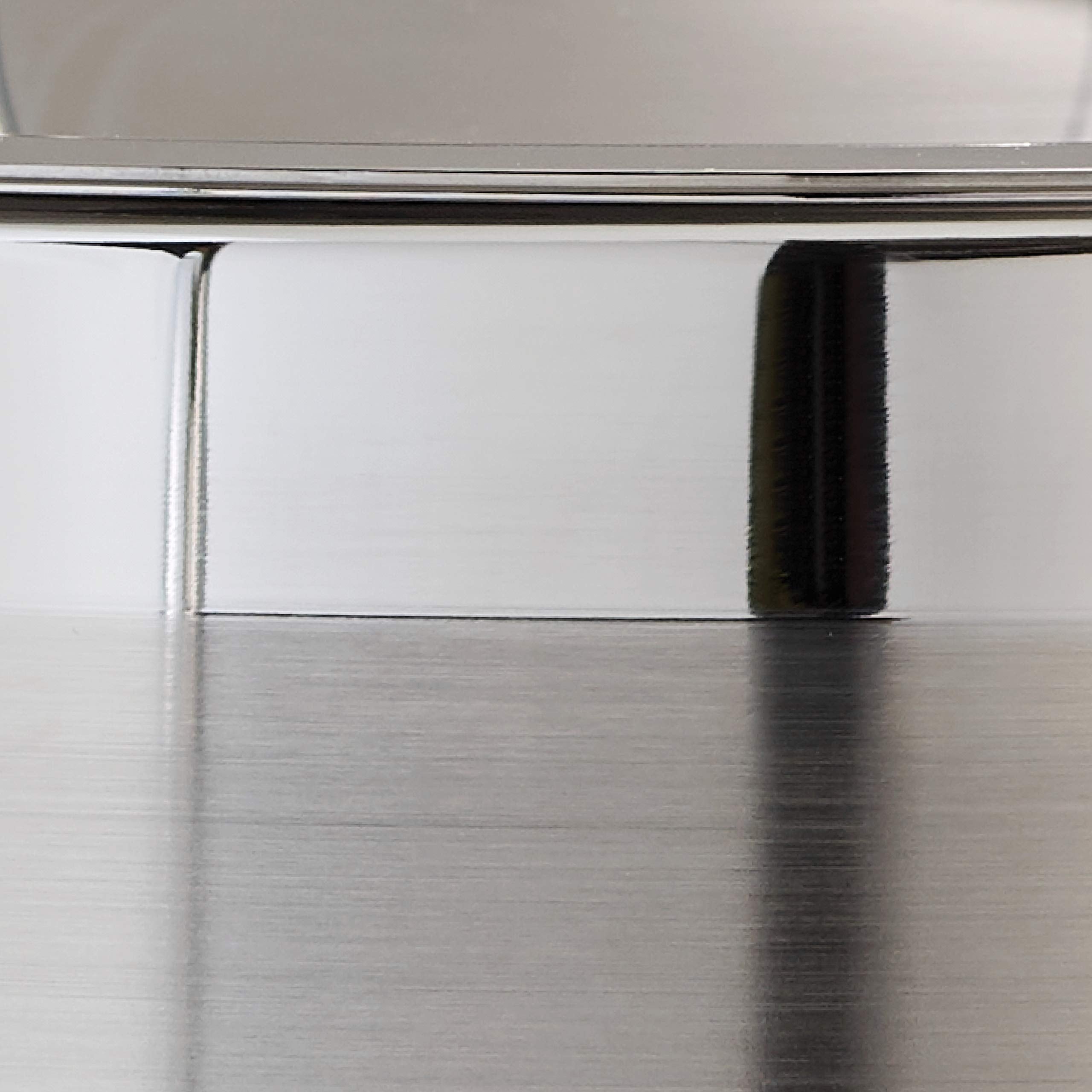 Tramontina pouring and draining scene showing controlled pour and ergonomic use