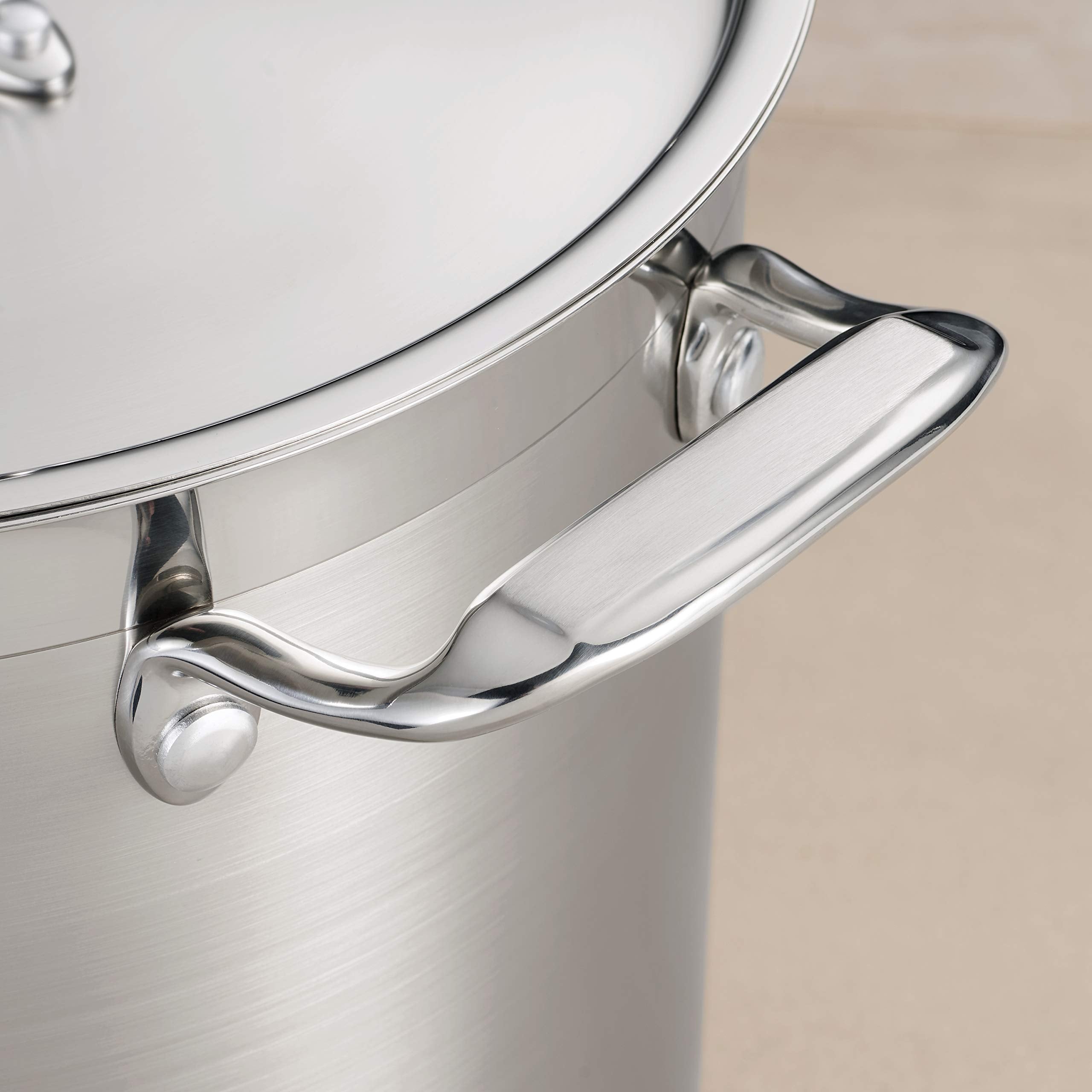 Tramontina tri-ply base underside showing layered construction for even heating