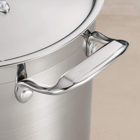 Tramontina tri-ply base underside showing layered construction for even heating