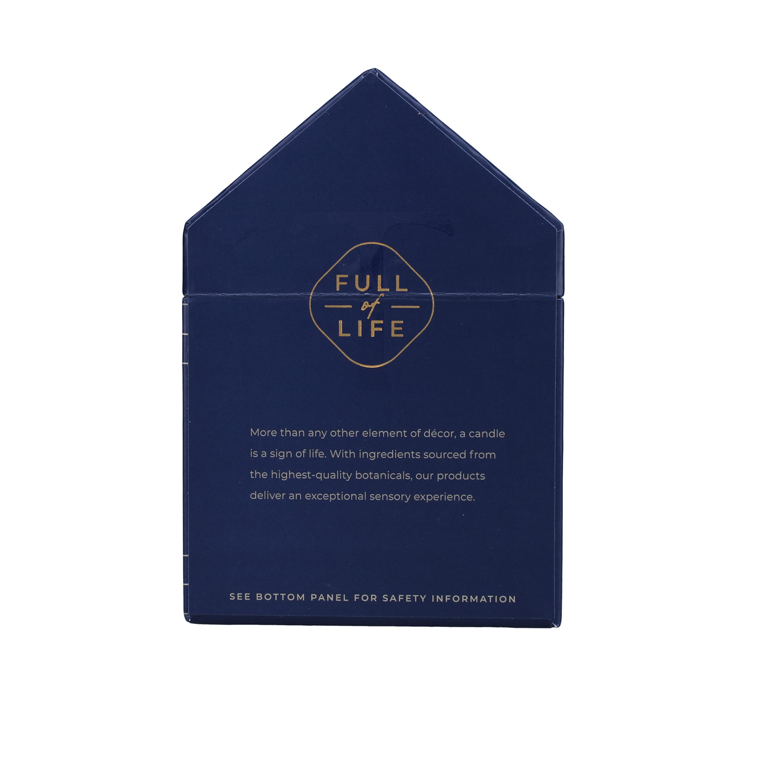 Trapp candle lit on bedside table creating cozy, calming atmosphere
