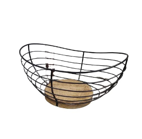 Tribello fruit basket next to common items showing scale and space-saving benefit
