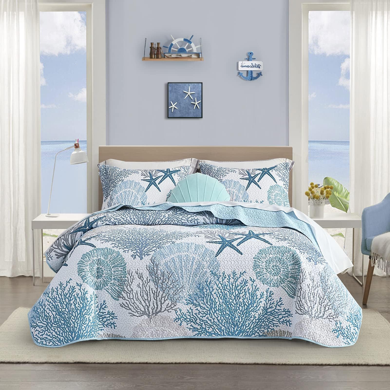 Tritard front view of coastal quilt on California King bed, shows full coverage benefit