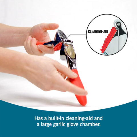 Trudeau garlic press chamber closeup revealing roomy clove capacity