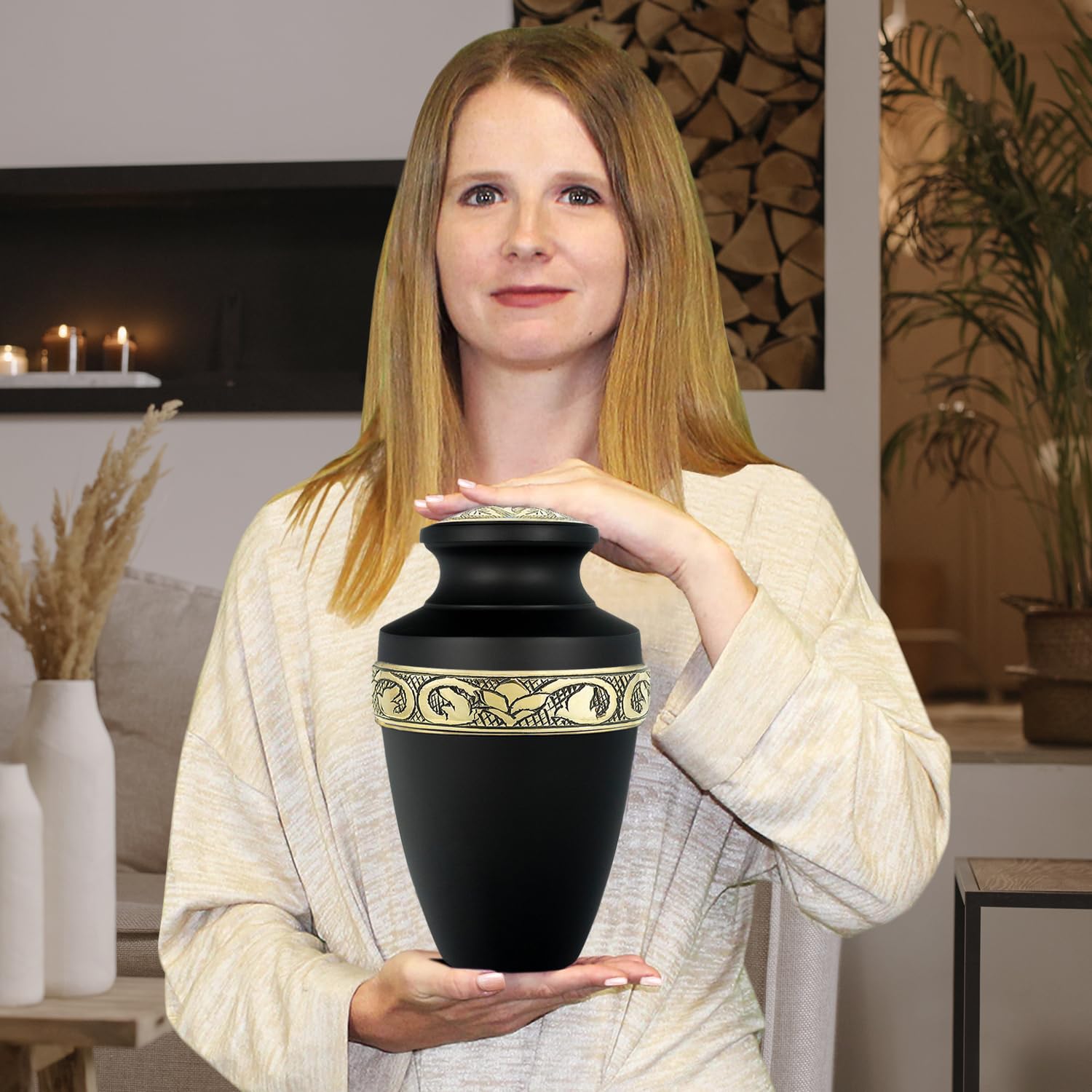 Trupoint Memorials urn beside hand for scale, shows adult-capacity portability