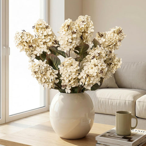 Ttranewsoo arranged in a vase on a living room table to enhance neutral home decor