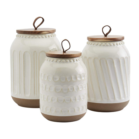 TTU Ziggy front packaging showing three white canisters and acacia lids for neat storage