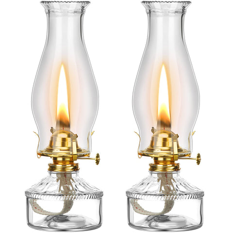Tuanse front view of two clear glass hurricane lamps showing vintage styling and reliable lighting