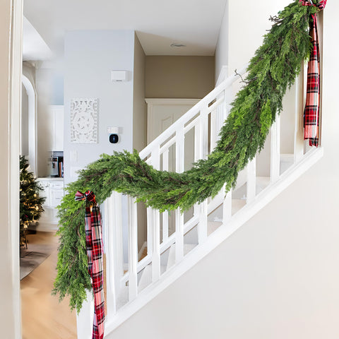 Tulvend garland styled with lights and ornaments for bright seasonal ambiance