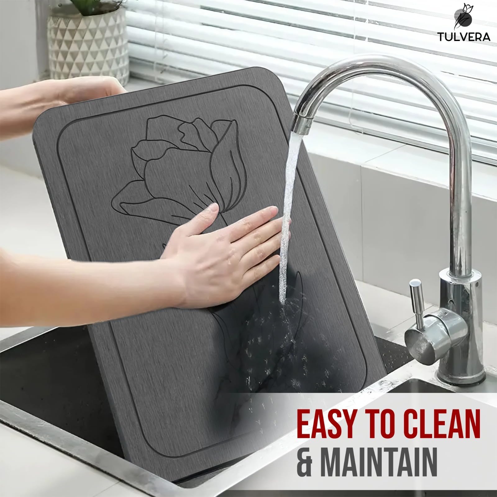 Tulvera mat beneath pet bowls illustrating water containment and easy clean benefit